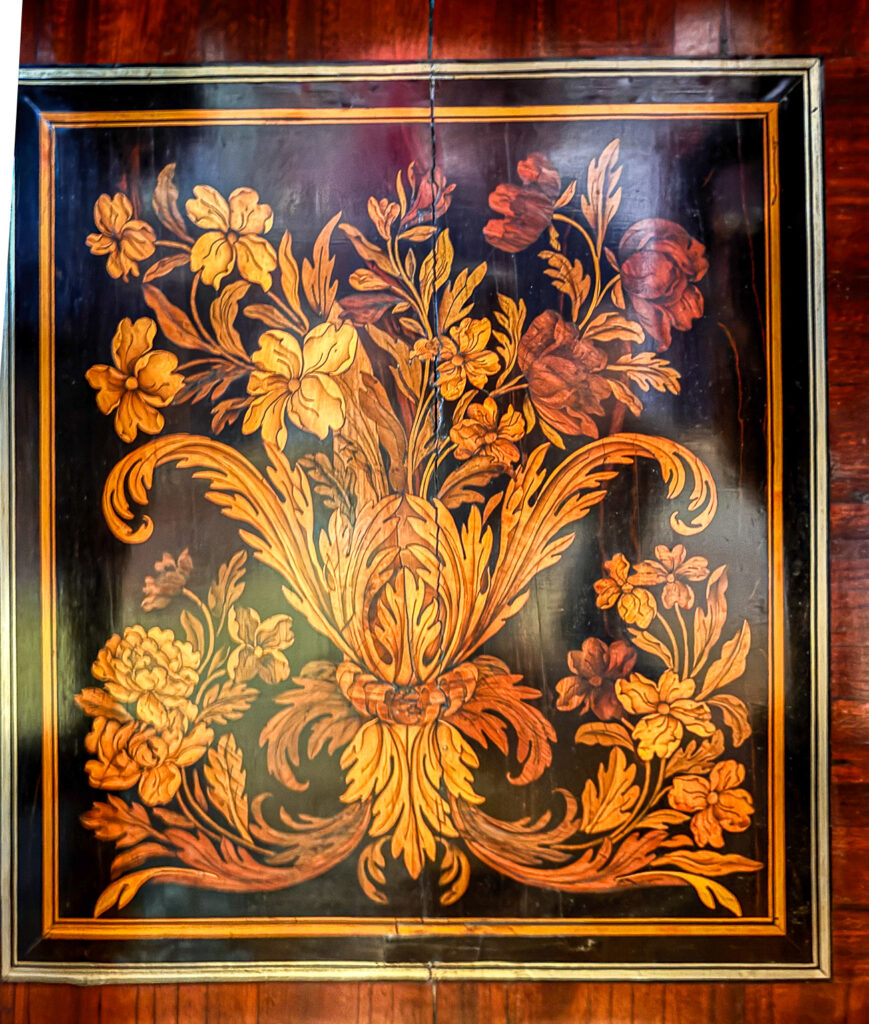 Detail of a case in early style of Charles Andre Boulle, following the Dutch tradition of pictorial marquetry