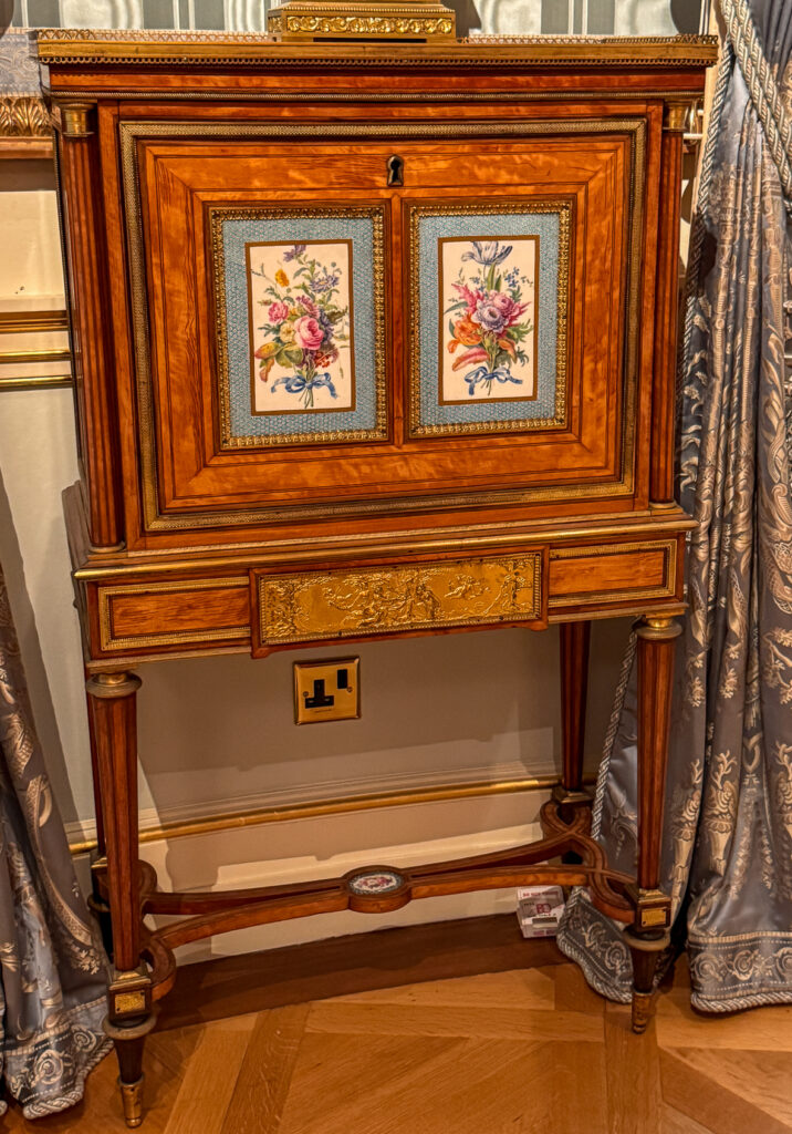 A French cabinet featuring Sevres porcelain panels